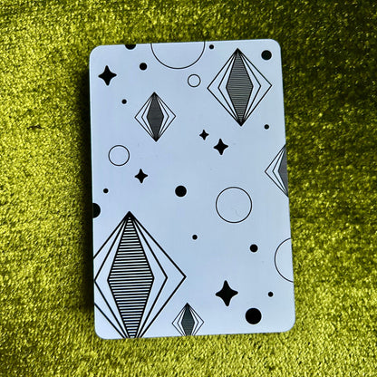 art print with geometric pattern on a green textured surface