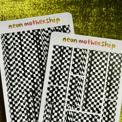 Two sticker sheets with checkered patterns and 'neon mothership' text on a green textured background