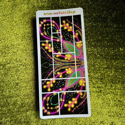 sticker sheet with neon abstract design on a green textured surface