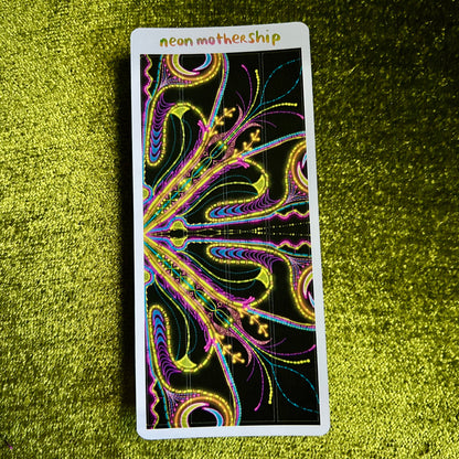 sticker sheet with neon motherhip design on a green textured background