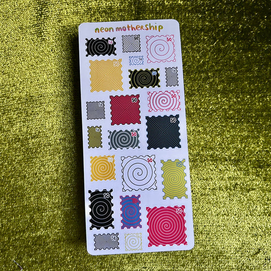 Sticker sheet with various patterns on a green textured background