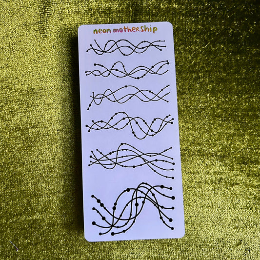 Card with wavy line designs on a green textured background
