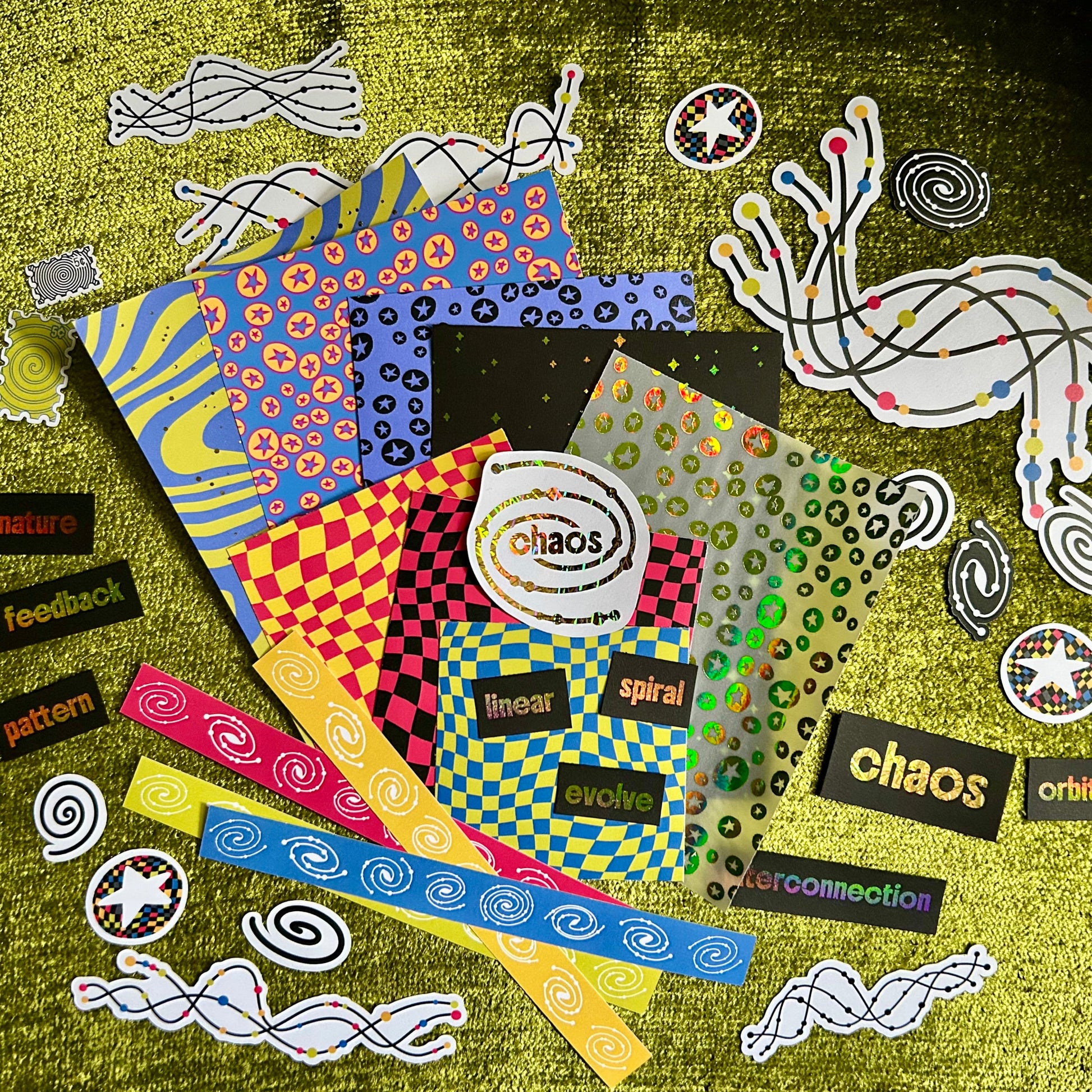 Colorful abstract design with text and patterns on a textured surface