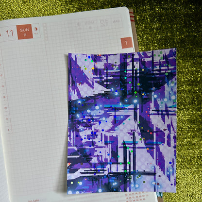 Notebook with a colorful abstract design on top of it