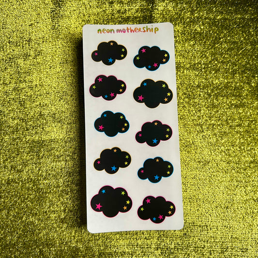 Sticker Sheet with cloud-shaped stickers on a green textured background