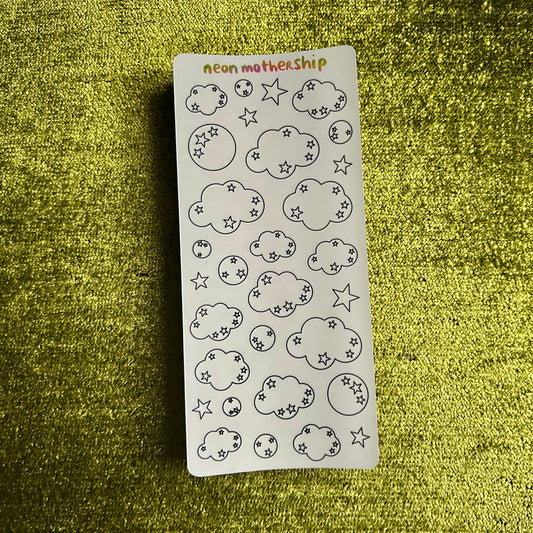sticker sheet with paper cloud stickers in black outlines on a green background