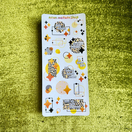 geometric sticker sheet on a green textured background