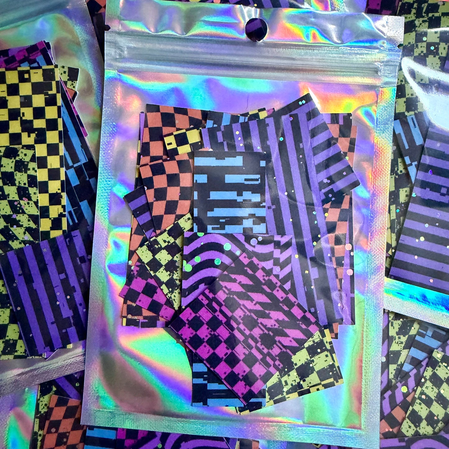 holographic bag with foiled colorful sticker scraps