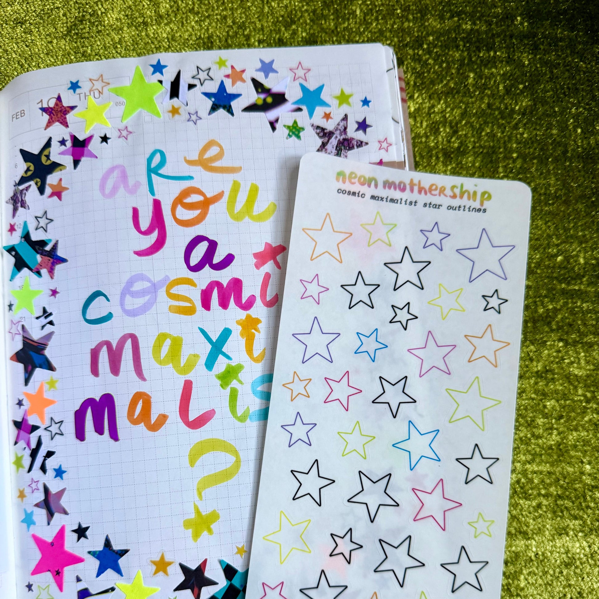 sheet of star stickers on a star filled journal page