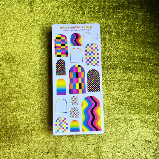 sheet of arch shaped colorful stickers on a green background