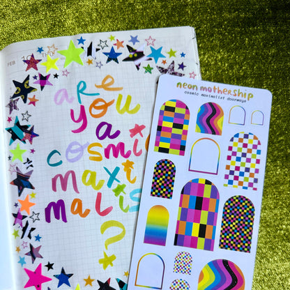 sheet of colorful arch shaped stickers on a colorful journal page
