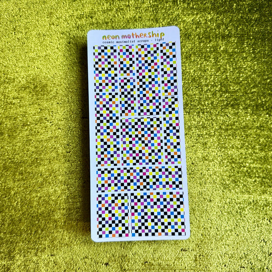 sheet of checkered stickers on a green background