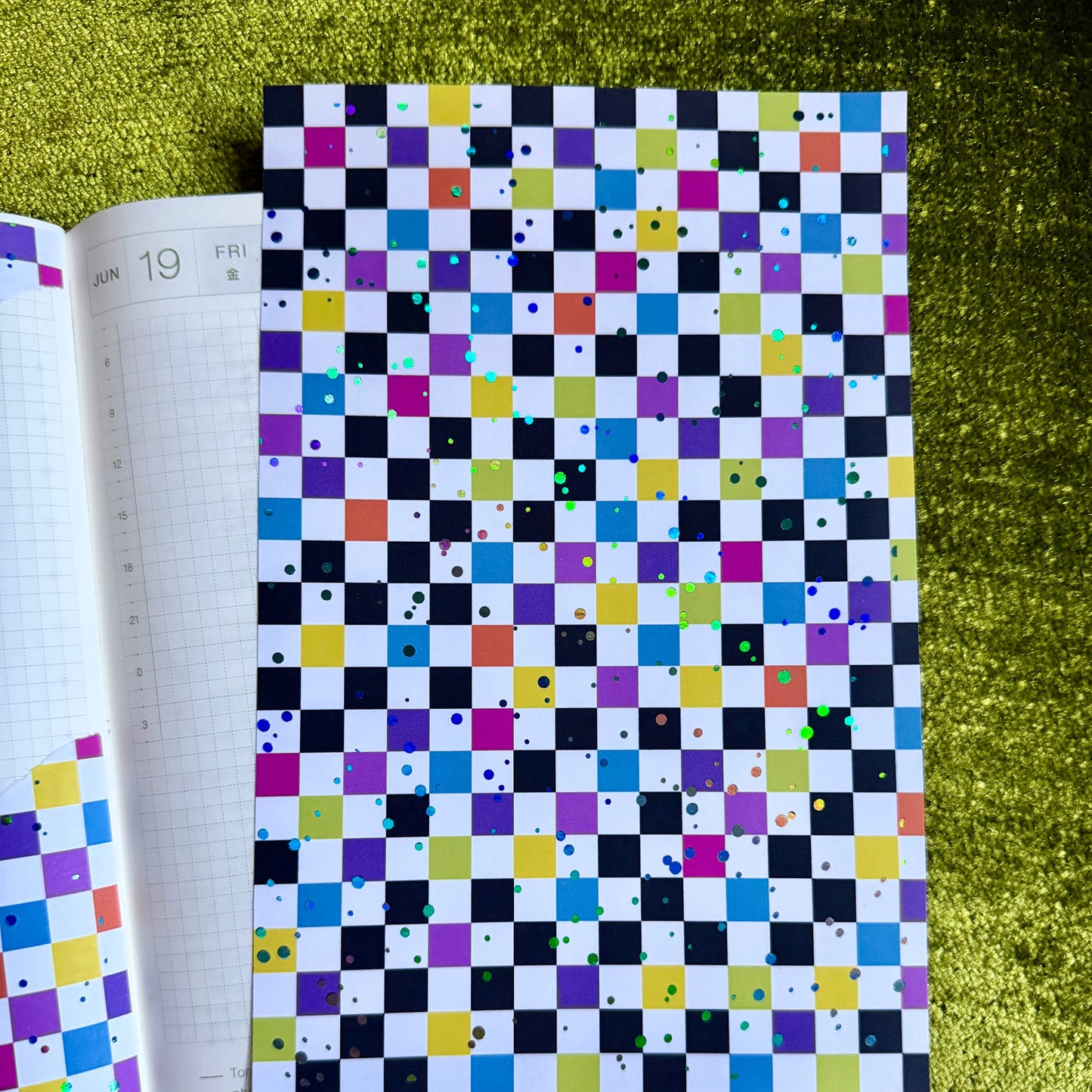 checkered sticker sheet on a journal page