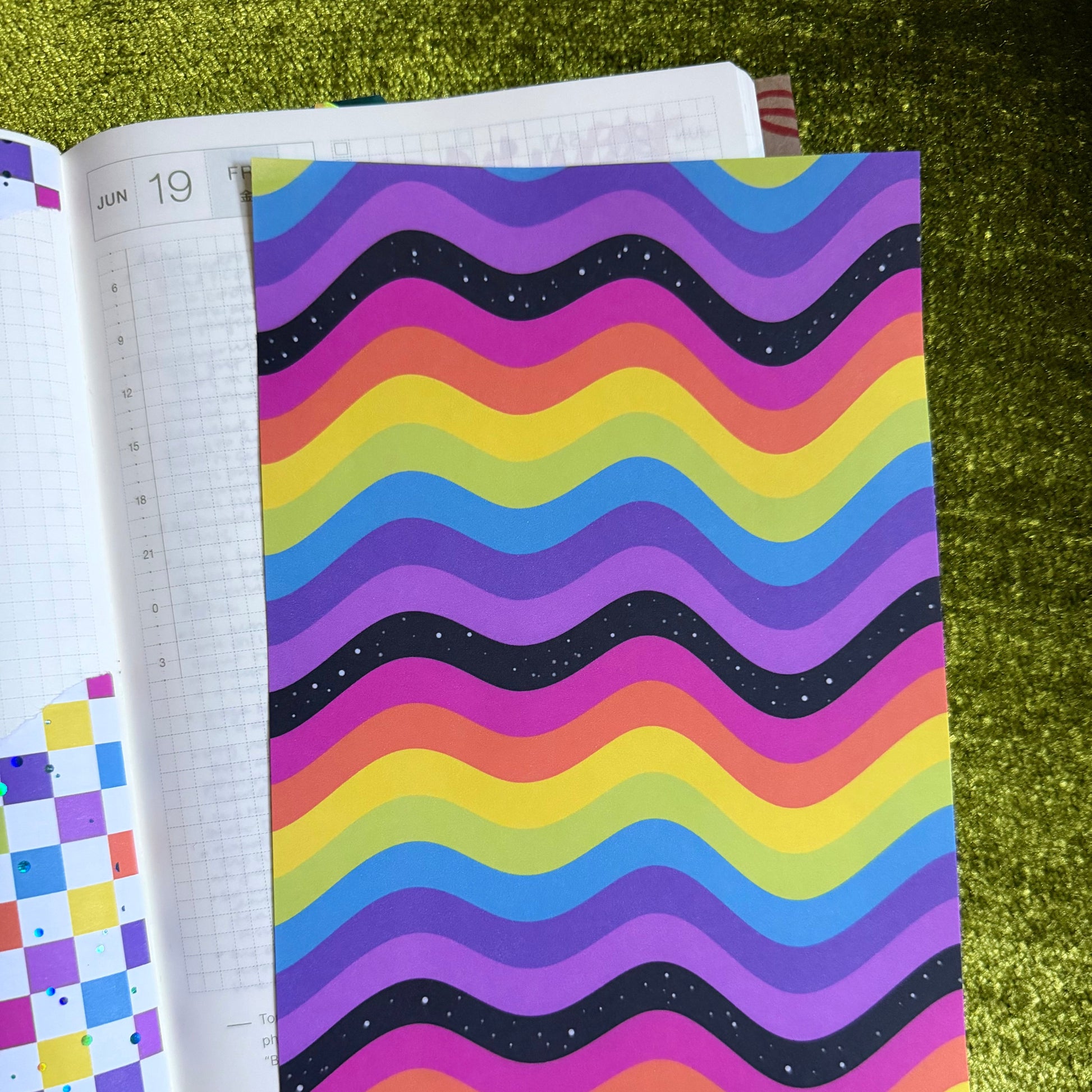rainbow sticker paper on a journal page