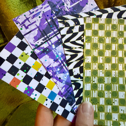 colorful sticker paper on a green background