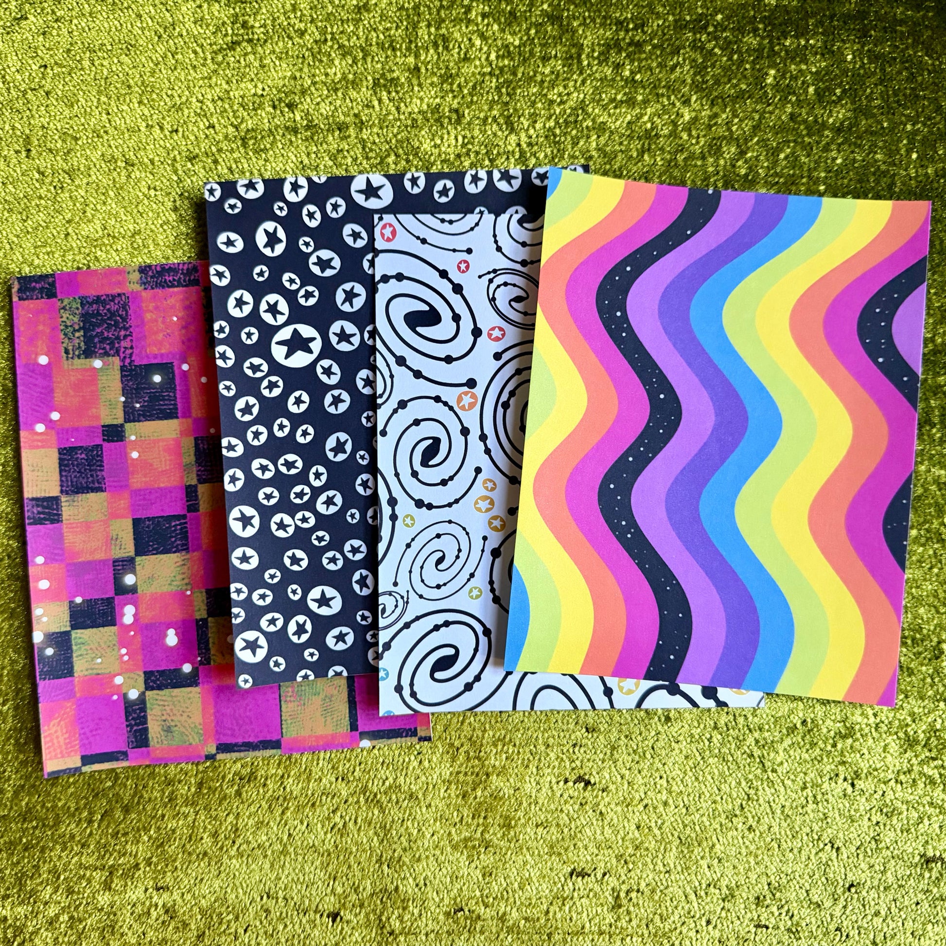 colorful sticker paper on a green background