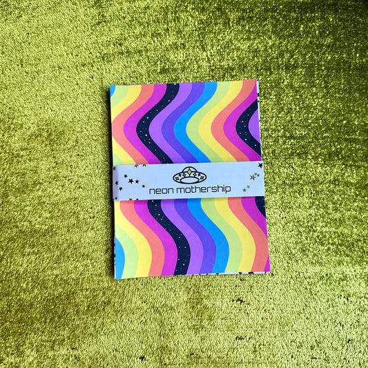 colorful sticker paper on a green background