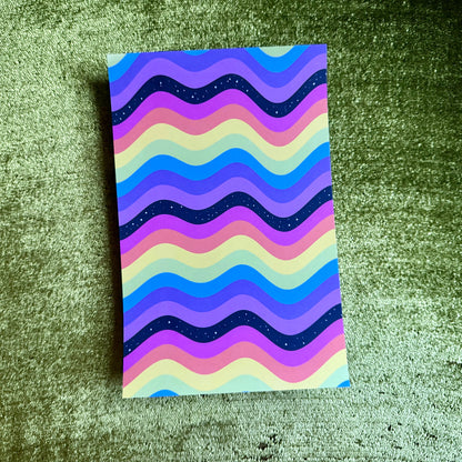rainbow sticker paper on a green background