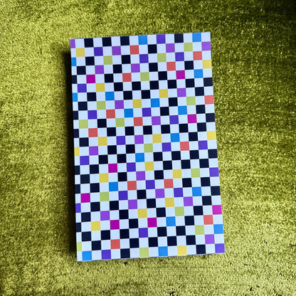 checkered sticker sheet on a green background