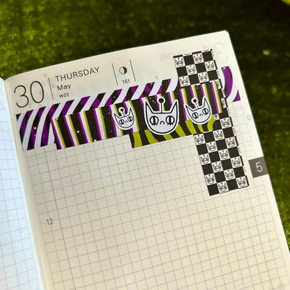 Sticker sheet with decorative designs on a notebook page