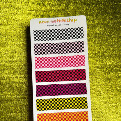 A sticker sheet from the brand neon mothership, featuring multiple horizontal checkered pattern strips in black, white, pink, red, purple, yellow, and orange, displayed on a textured yellow-green background.