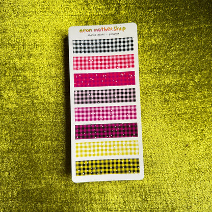 A vertical sticker sheet displaying multiple washi tape patterns in neon shades of pink, purple, yellow, and black, set against a textured yellow background.