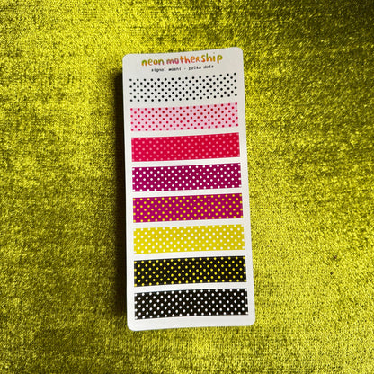 A vertical sticker sheet from neon mother ship featuring multiple horizontal rows of polka dot washi tapes in black, pink, red, magenta, yellow, and black, displayed on a textured yellow background.