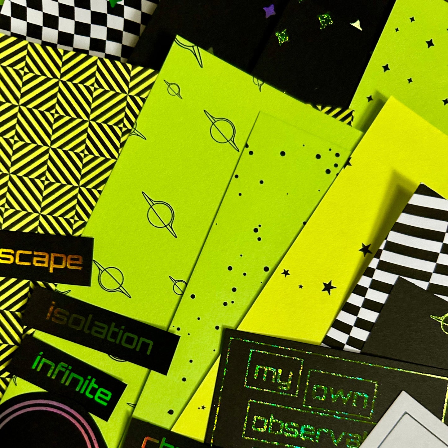 Colorful geometric patterns and text on a black background