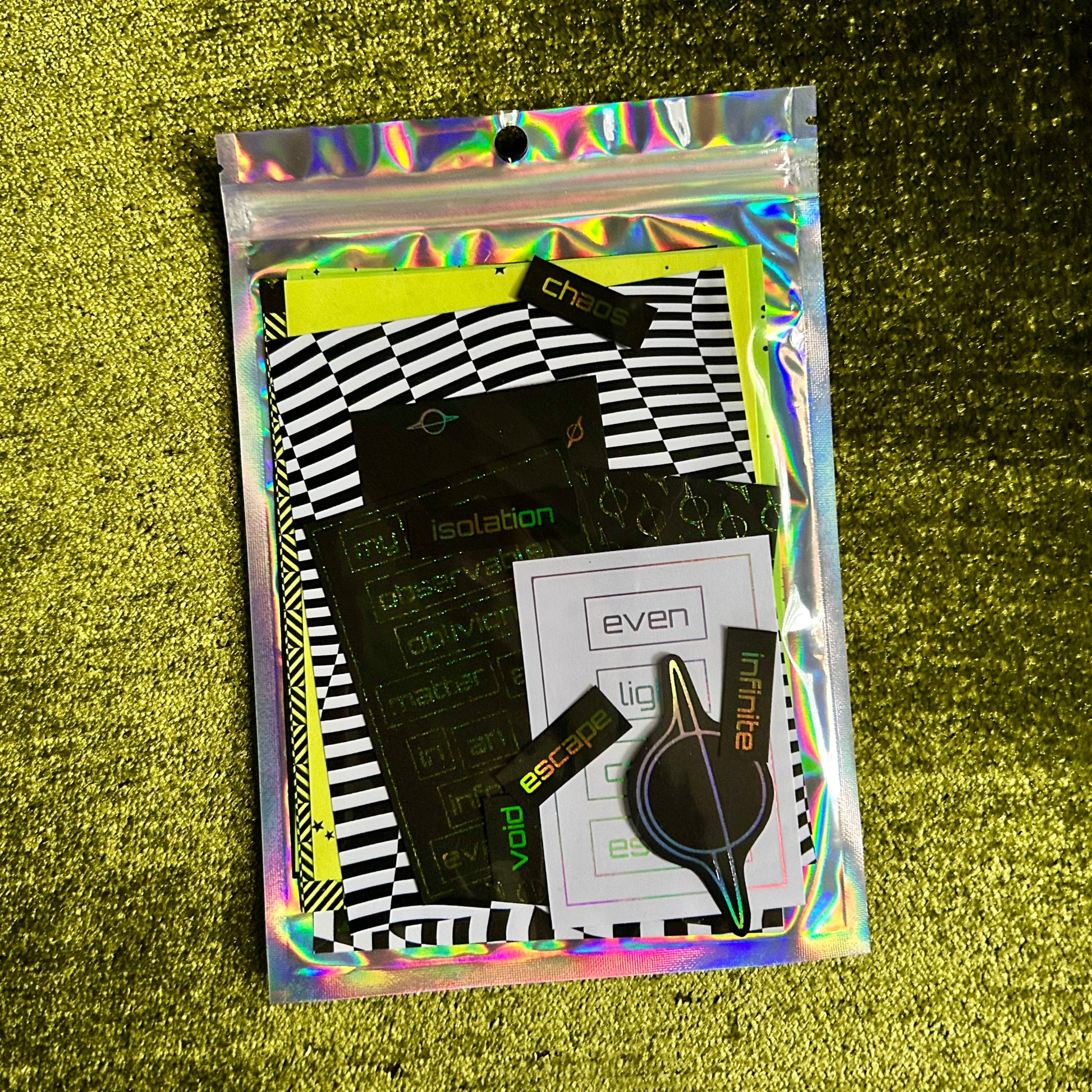 Packaged product with a colorful transparent sleeve on a textured green surface