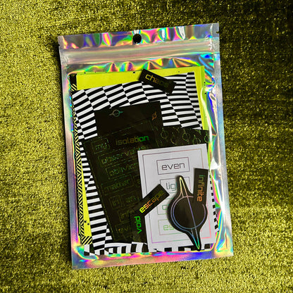 Packaged product with a colorful transparent sleeve on a textured green surface