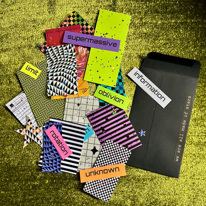 Collection of colorful papers with text on a textured green surface