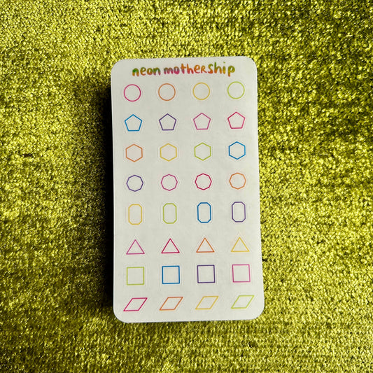 Sticker with geometric shapes on a green textured background